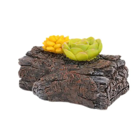 A decorative piece featuring two small succulents, one yellow and one green, placed on a textured, brown artificial tree bark base with a realistic, rugged surface.