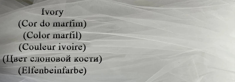 Ivory fabric background with the word "Ivory" written in English, Portuguese, Spanish, French, Russian, and German in black text.