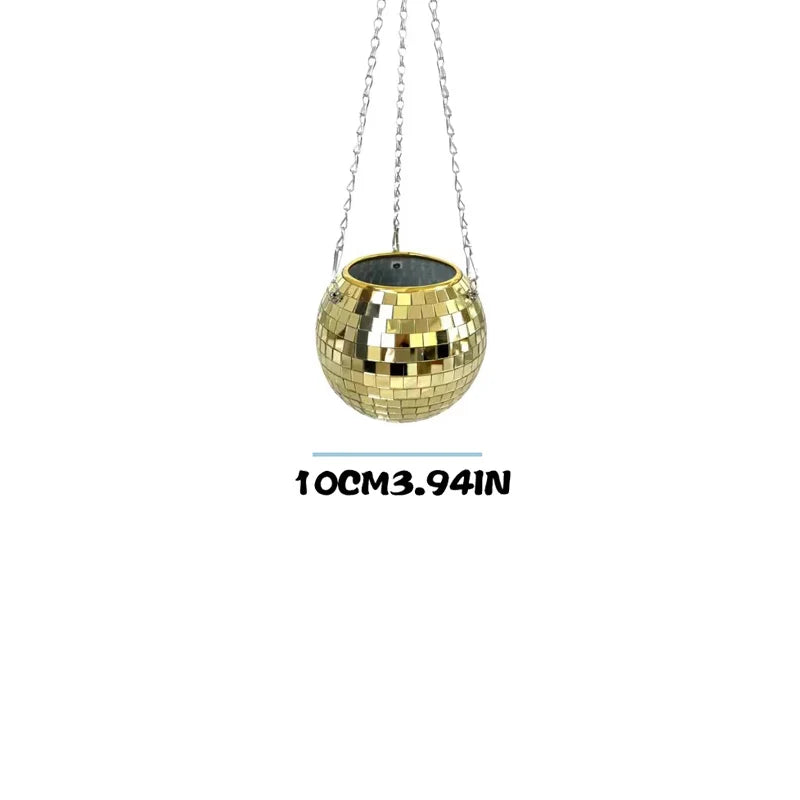 Gold disco ball planter, 10 cm (3.94 inches) in diameter, hanging by chains, with reflective mosaic tiles on the surface, set against a plain white background.