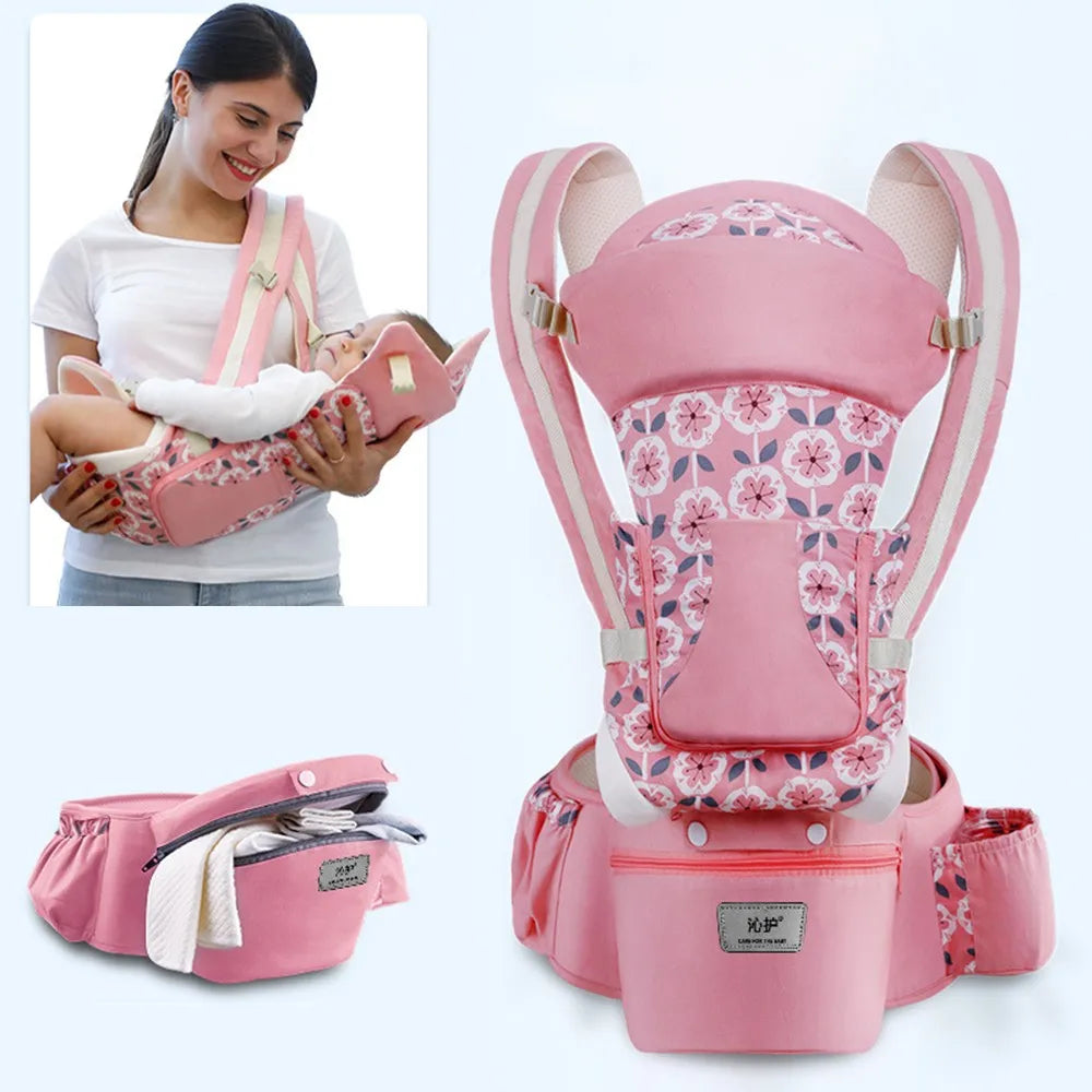 A pink floral baby carrier set, showing a close-up and an image of a woman holding a baby in the carrier. The set includes shoulder straps, a seat, and storage pockets.