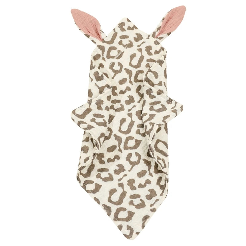 Leopard-print towel with a hood featuring pink ears, designed for children. The towel has a soft, textured appearance and is laid out flat against a plain background.