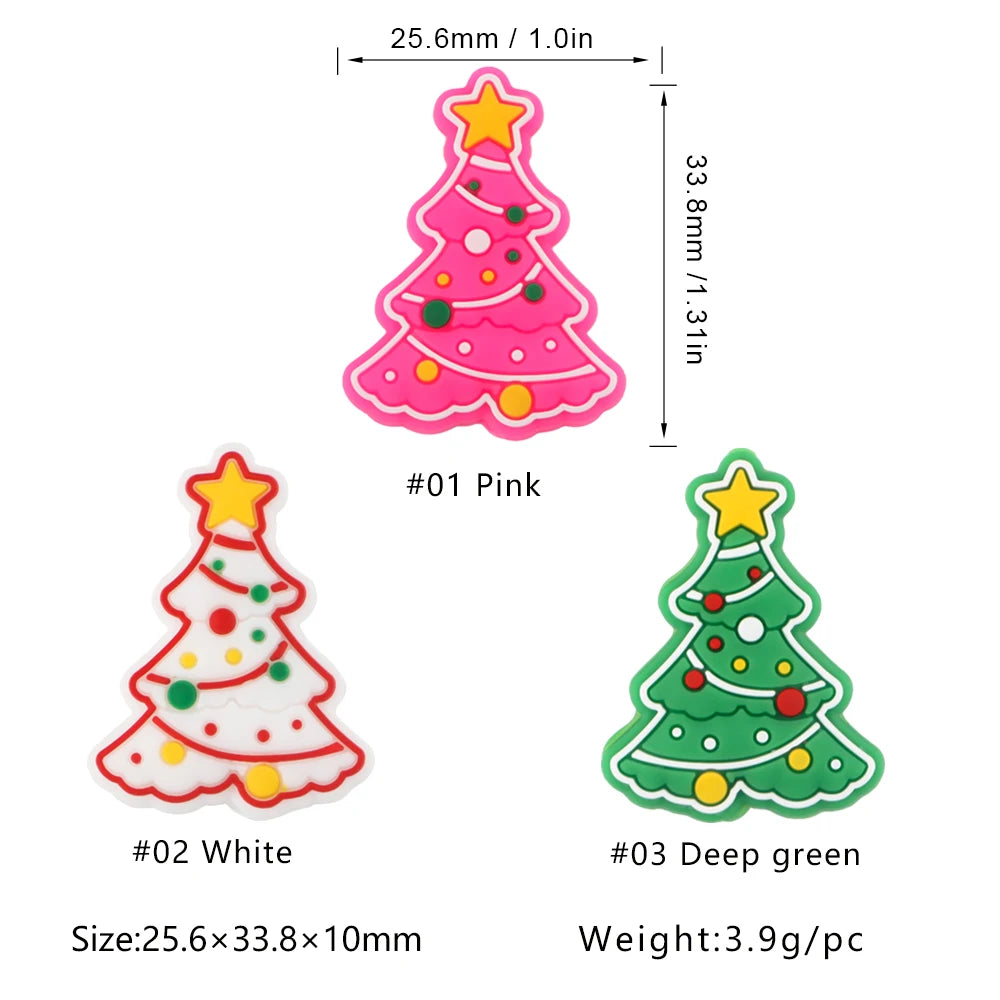 Three Christmas tree decorations in pink, white, and deep green with stars on top. Each measures 25.6mm wide, 33.8mm tall, and weighs 3.9g.