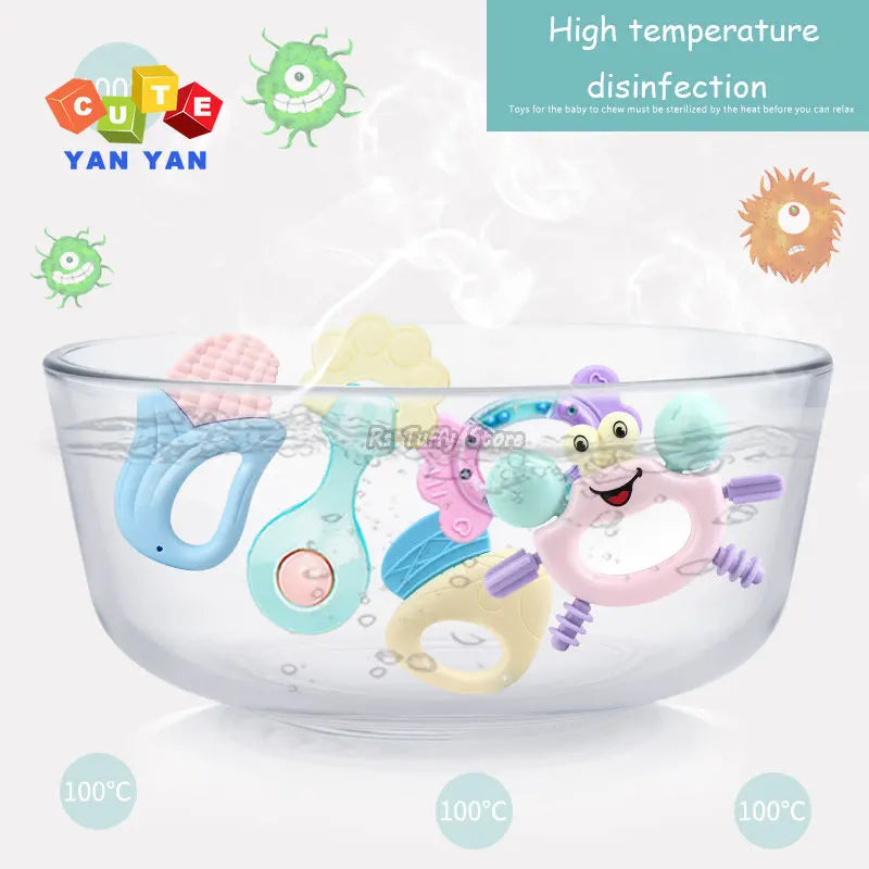 Colorful baby teethers in a steaming bowl of water for high-temperature disinfection. Cartoon germs are shown around, emphasizing cleanliness. Temperature marked as 100°C.