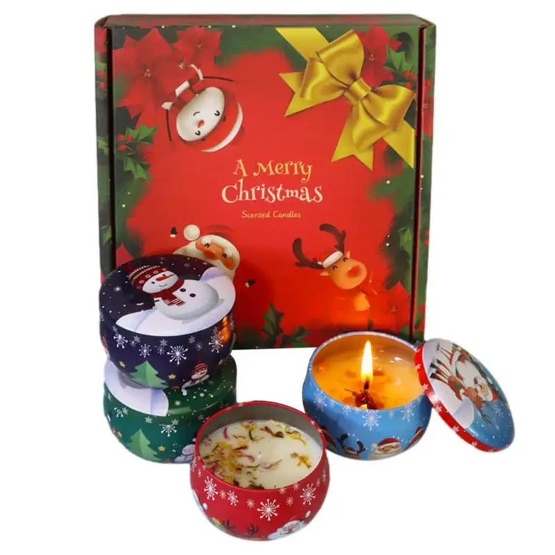 Christmas-themed scented candles in colorful tins with holiday designs, placed beside a festive red gift box adorned with a bow and seasonal illustrations.