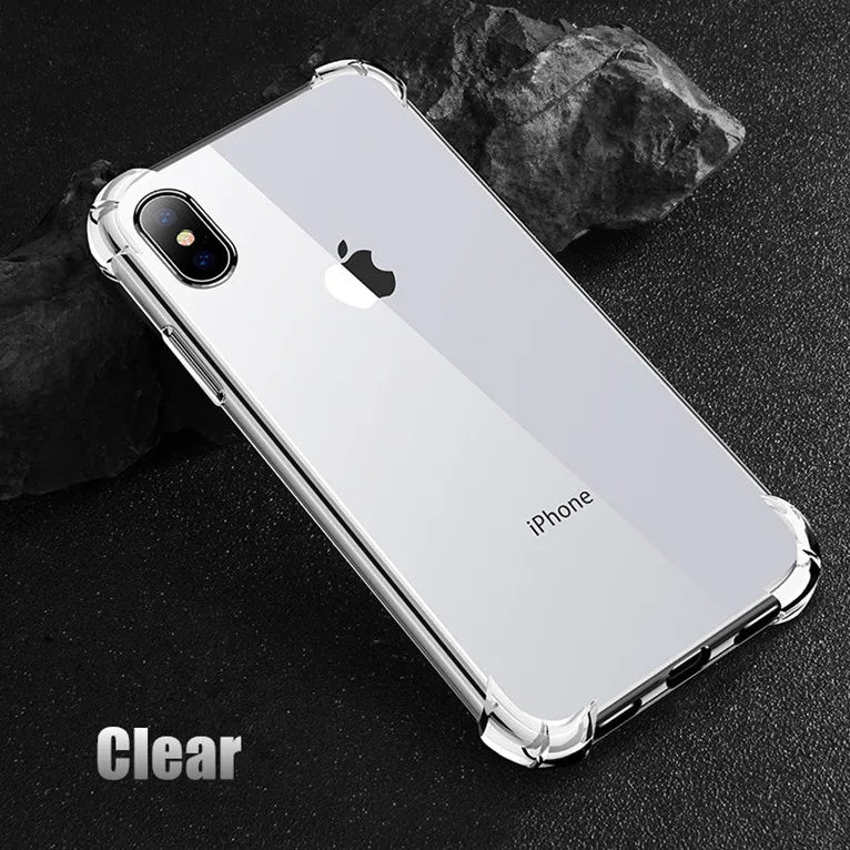 Clear iPhone case showcasing sleek design and edge protection, placed on a textured black surface with a dark rock nearby.