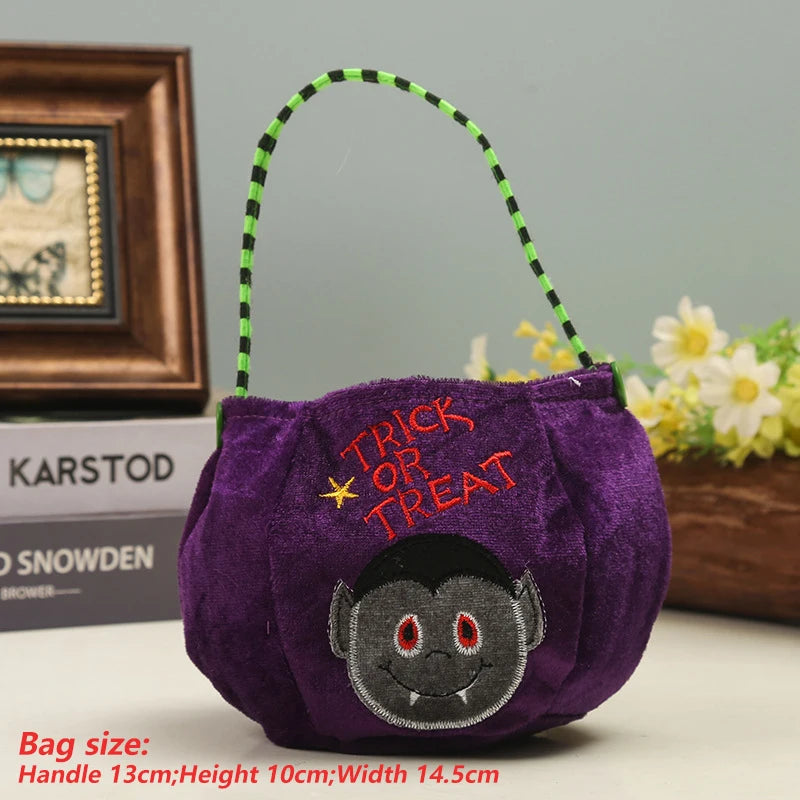 Purple Halloween bag with "Trick or Treat" text and a smiling vampire face. It has a green and black striped handle. Size details in red text. Background includes a frame and flowers.
