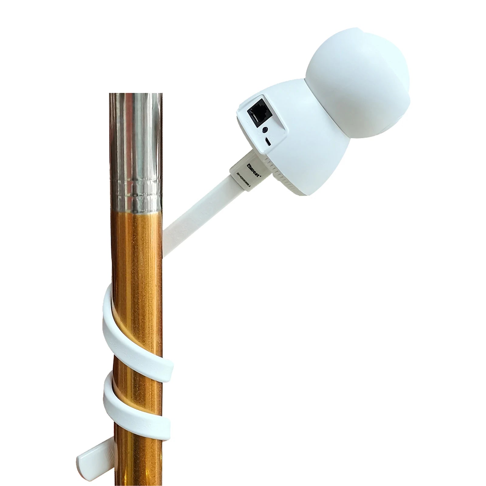 A white security camera with a spherical shape is mounted on a gold-colored pole. The camera is connected via a visible cable, which spirals around the pole.