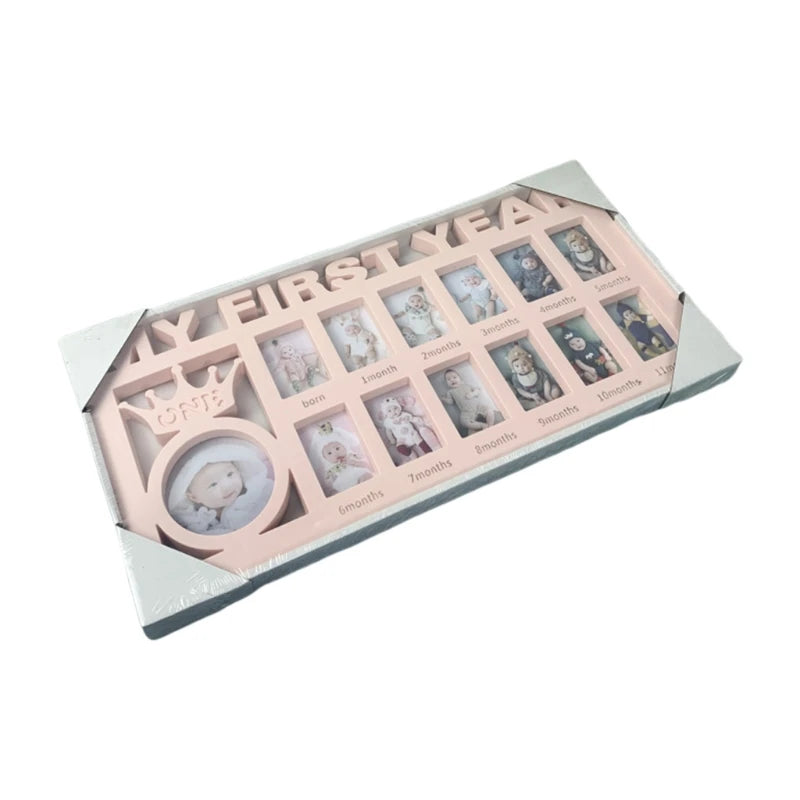 Pink photo frame labeled “My First Year” holds 13 small photos for each month of a baby's first year. It features a crown design and circular spot for a newborn picture.