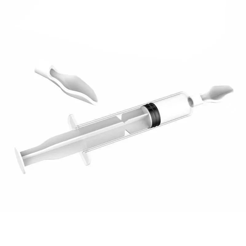 Transparent plastic syringe with a black plunger and removable protective cap, designed for precision liquid dispensing. The cap is partially removed, revealing the syringe tip.