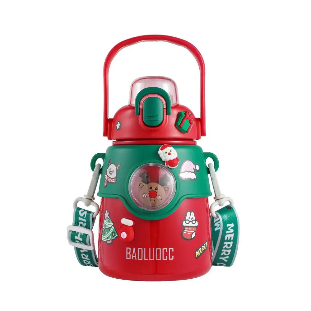 Red and green insulated water bottle with festive Christmas designs, including Santa, reindeer, and a Christmas tree. Features a carrying strap and playful decorative stickers.