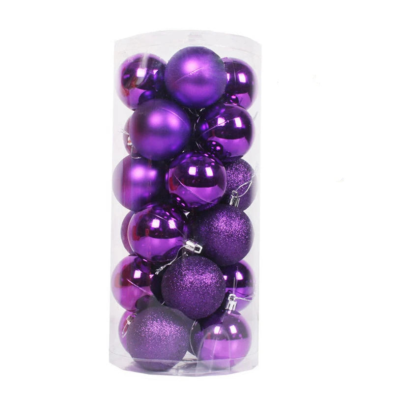 A clear plastic container holds an assortment of shiny and glittery purple Christmas ornaments of varying shades, perfect for festive decoration.