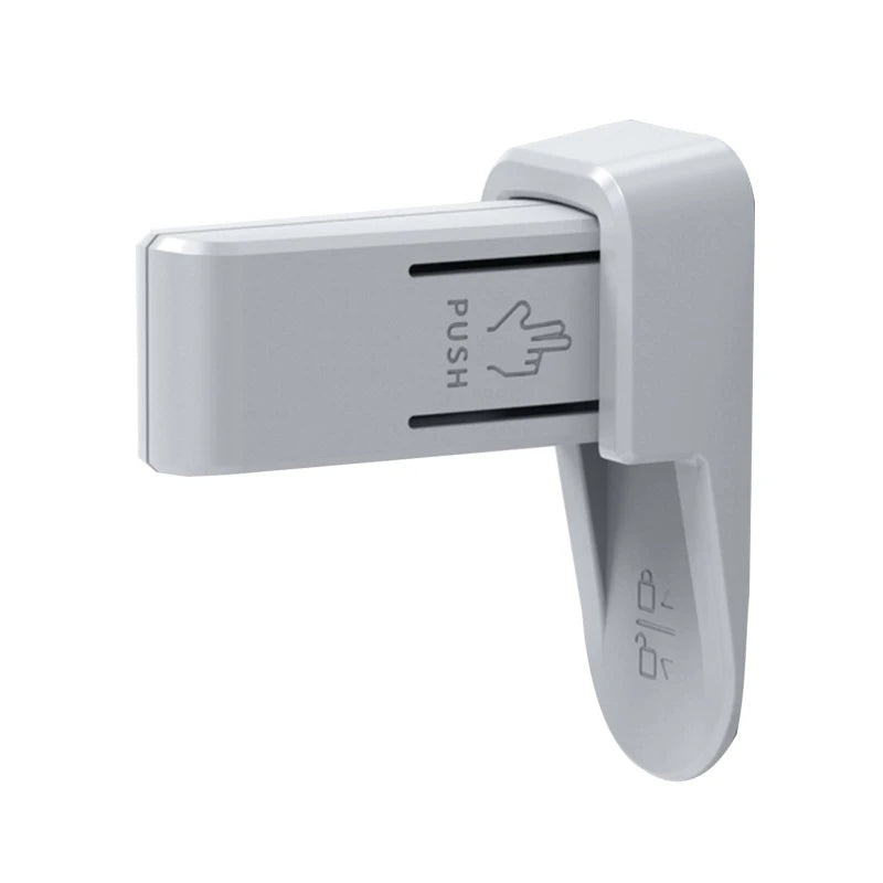 Gray plastic wall-mounted sanitizer dispenser with a push handle and hand symbol. The handle is labeled "PUSH," indicating where pressure should be applied.