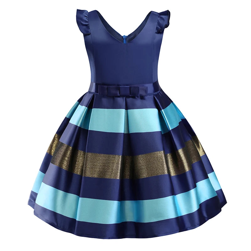 Girls' dress with navy blue bodice, ruffled shoulders, and skirt featuring horizontal stripes of blue, aqua, and metallic gold. Decorative bow at the waist.