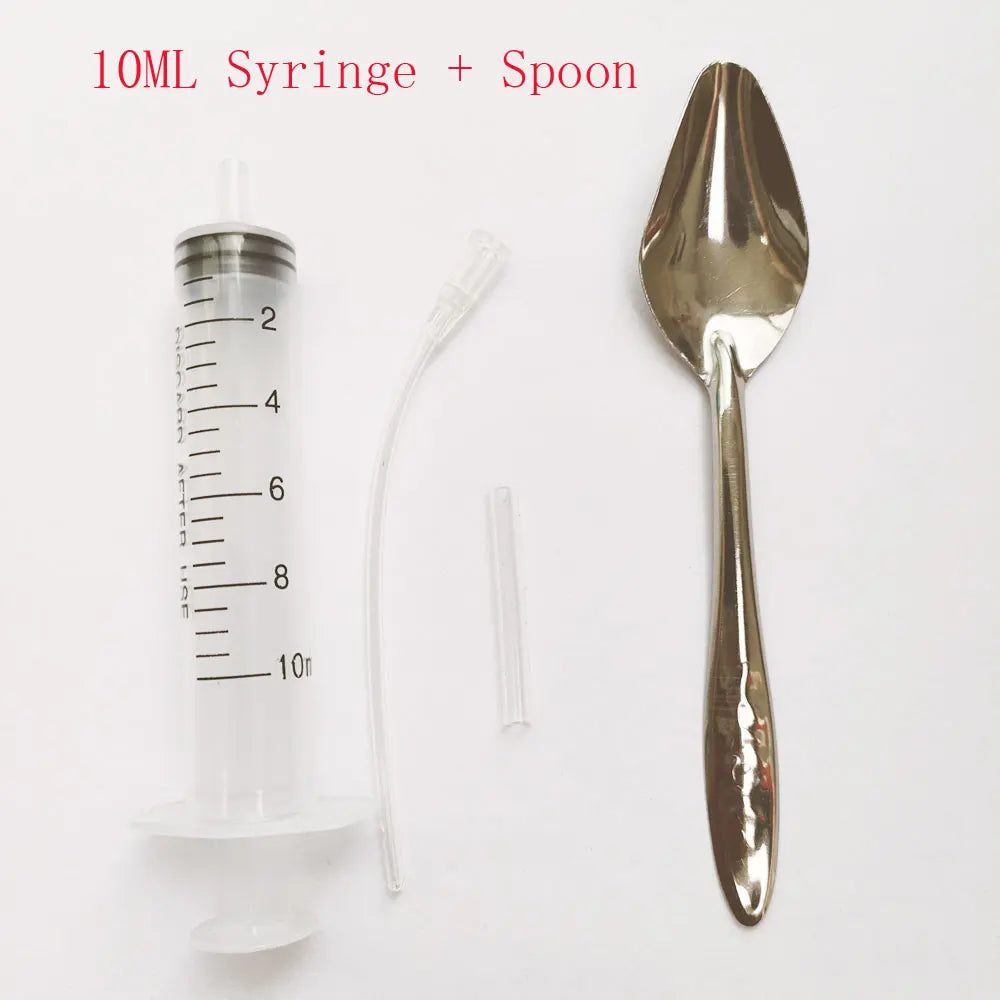 10ml syringe with measurement markings, a flexible tube, and a silver spoon on a white background. Accompanied by the text "10ML Syringe + Spoon" in red.