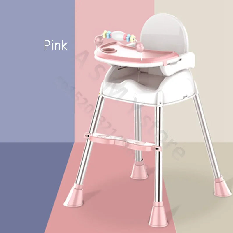 Pink high chair with a white seat, pink tray featuring a toy bar, and metal legs. Stands against a backdrop of pastel blue, pink, and beige color blocks.