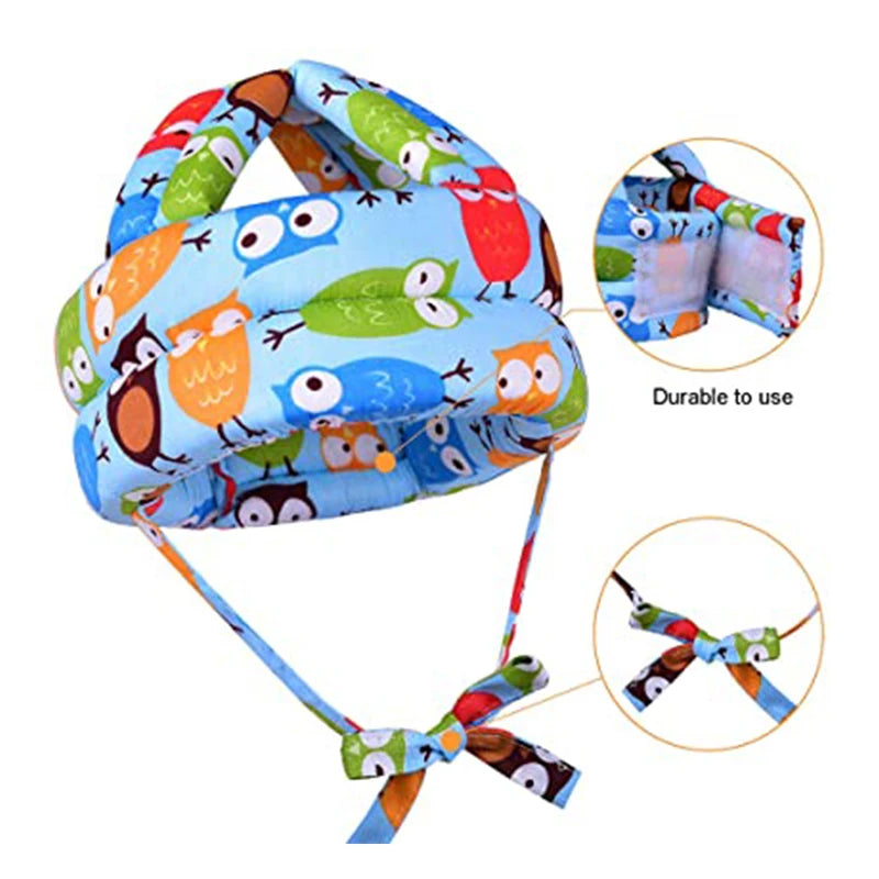 Colorful toddler helmet with owl patterns on a light blue background, featuring a cushioned design and adjustable straps. Insets highlight durability and strap details.