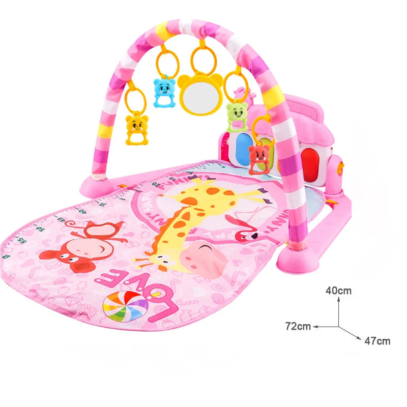 Pink baby playmat with colorful animal designs, a giraffe, and the word "LOVE." Overhead arch has hanging toys and a mirror. Dimensions: 72cm x 47cm x 40cm.