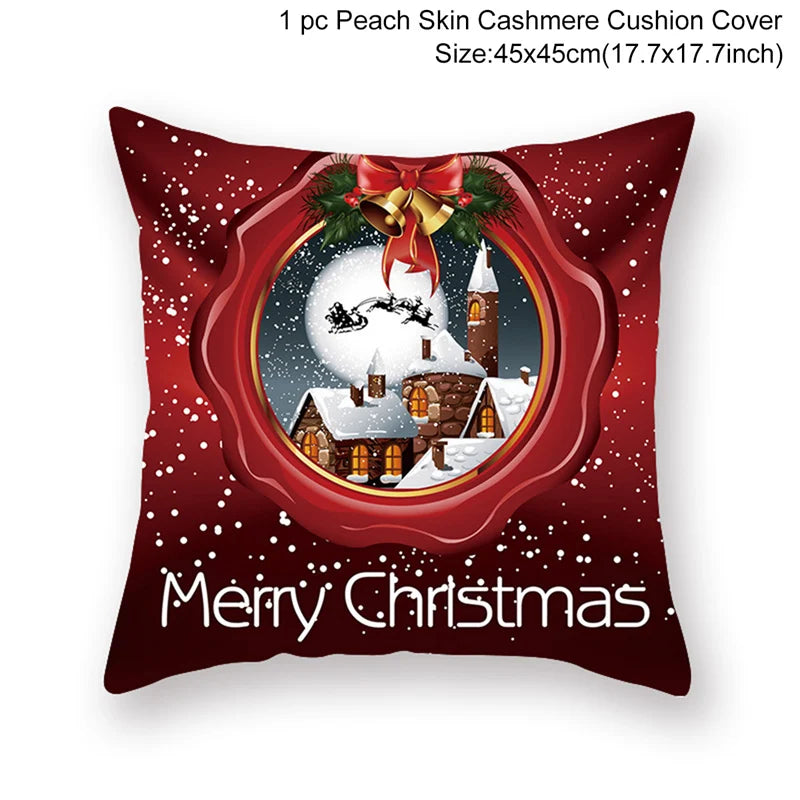 Red Christmas cushion cover featuring a snowy village, Santa's sleigh silhouette, and festive decorations. Text reads "Merry Christmas." Size: 45x45cm.