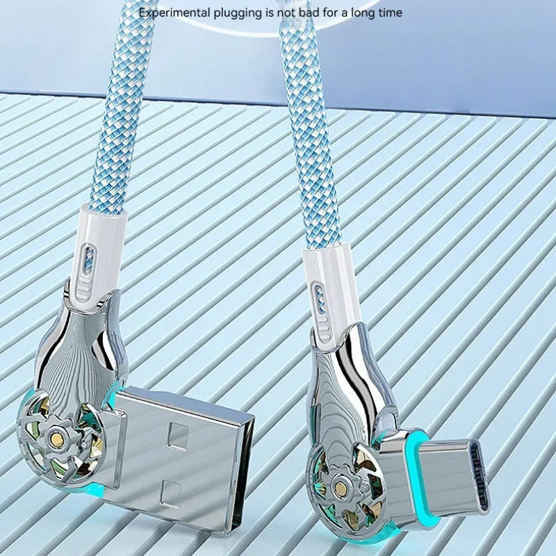 Stylish USB and USB-C cables with blue braided covers, silver connectors, and glowing accents are laid on a striped light blue surface.
