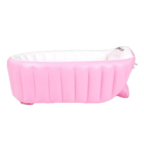 Pink inflatable bathtub with a textured, ribbed exterior and a smooth white interior. The tub is oval-shaped, featuring a headrest and a slightly elevated base for support.
