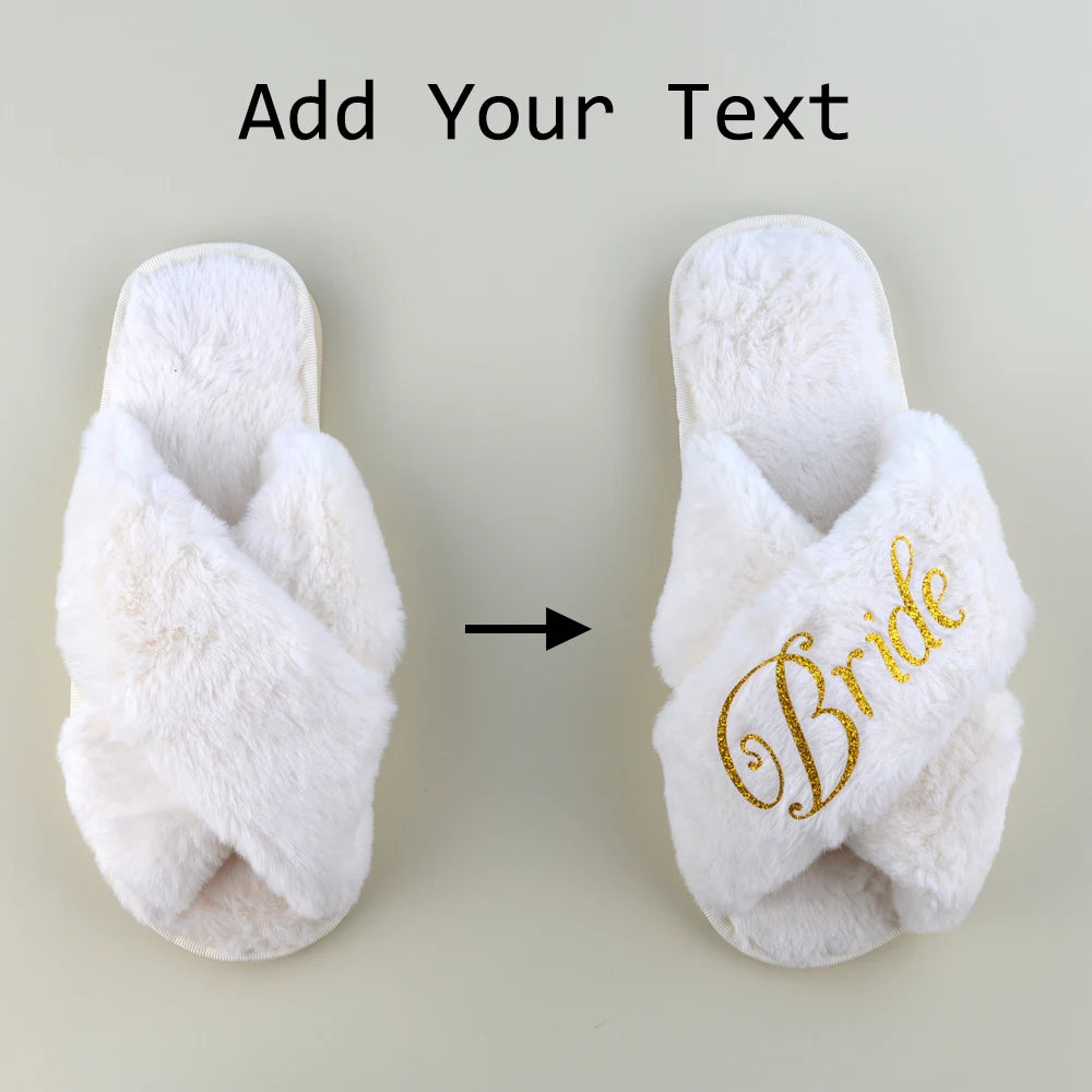 White fuzzy slippers with crisscross straps against a light background. Left slipper is plain; right slipper has "Bride" embroidered in gold script. Arrow indicates personalization option.