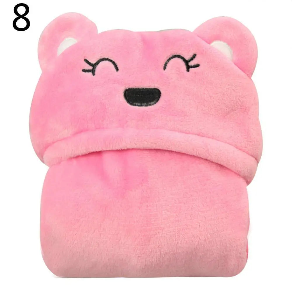 Pink plush fleece blanket folded to resemble a cute bear with closed eyes and a smiling mouth. The fabric is soft, and the bear features are stitched on. Number 8 appears in the corner.