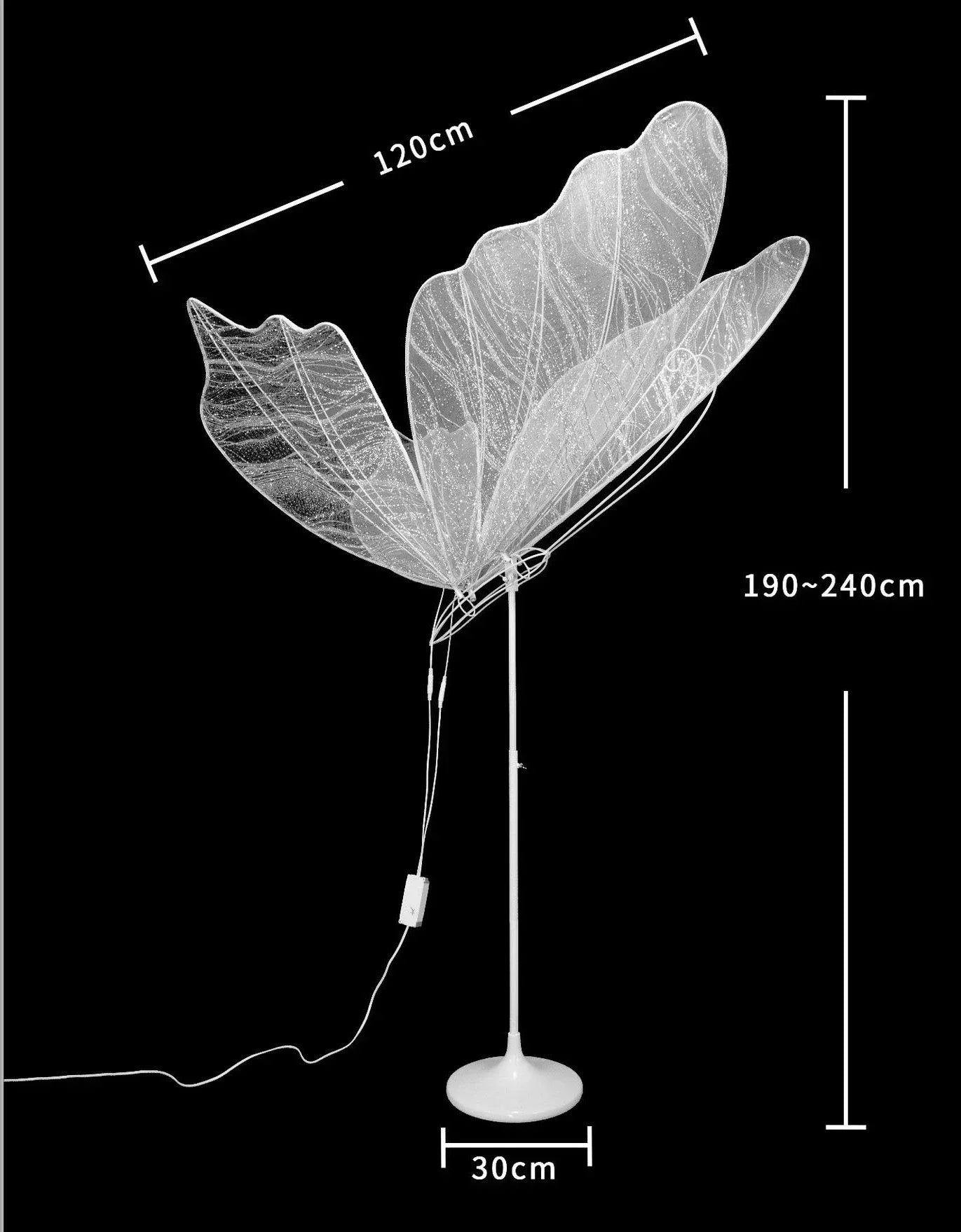 A large, leaf-shaped floor lamp with intricate veining, measuring 120 cm wide and up to 240 cm tall. It stands on a 30 cm round base with wires visible against a black background.