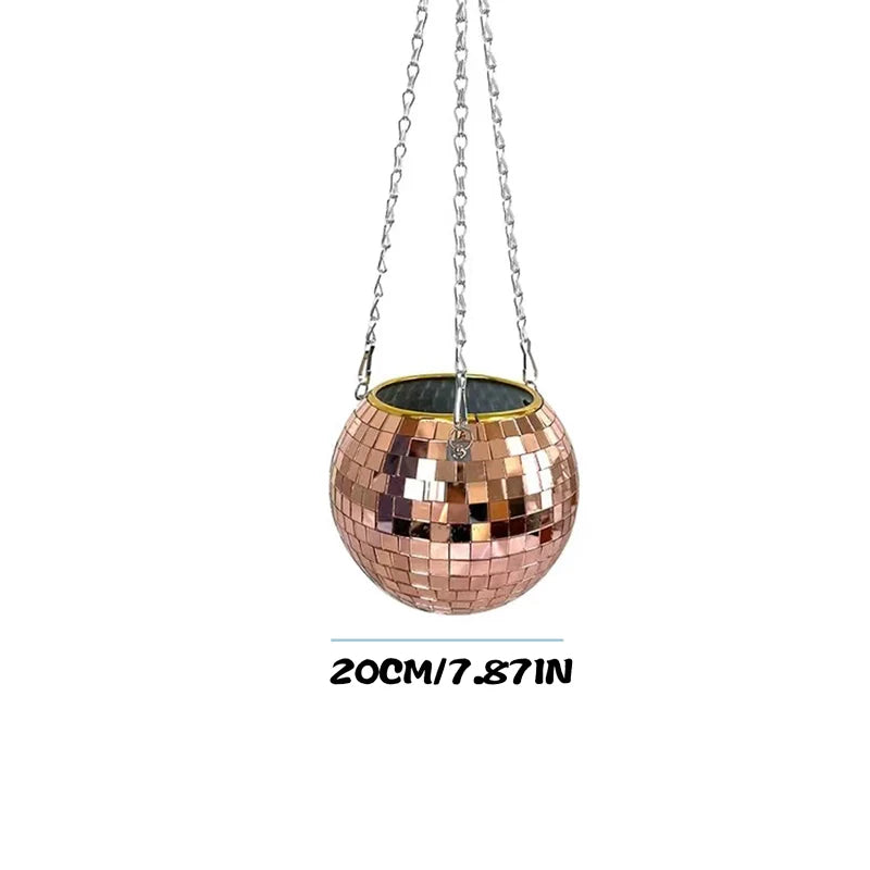 Copper disco ball planter with shiny square tiles, hanging from chains. Measures 20 cm (7.87 inches) in diameter.