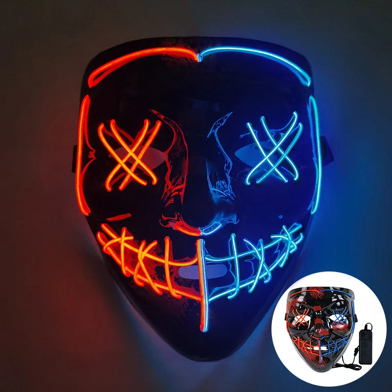 Illuminated mask with red and blue neon lights in a cross and stripe pattern over eyes and mouth, evoking a sinister smile. A small inset shows the mask with a battery pack.