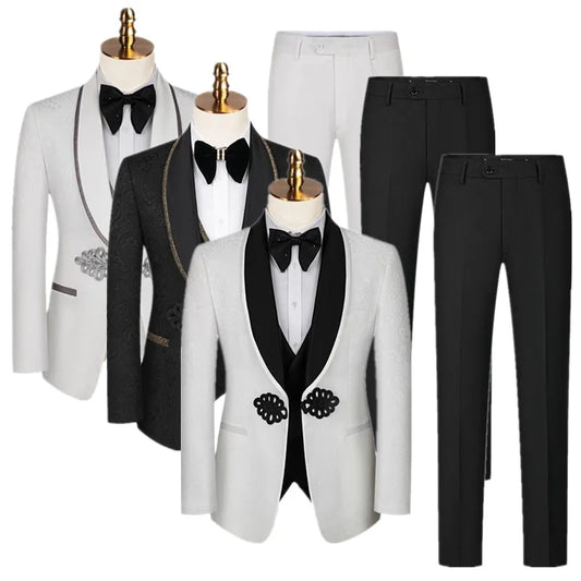 Three elegant tuxedos in white and black displayed on mannequins, each with unique detailing and paired with black bow ties. Two pairs of black pants are shown beside them.