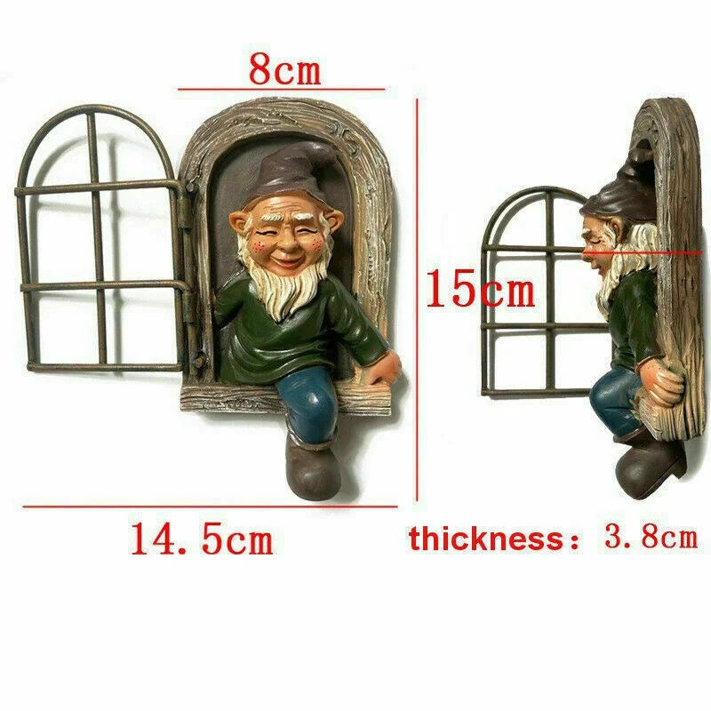 A gnome figurine sits in a window frame. It measures 14.5cm wide, 15cm tall, and is 3.8cm thick. The window's left section measures 8cm and swings open. The gnome has a happy expression.