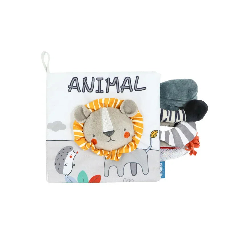 Soft fabric baby book titled "Animal" with cute lion face on the cover. Features colorful textures and animal illustrations, including a hedgehog, on the front. Tabs peek from the side.