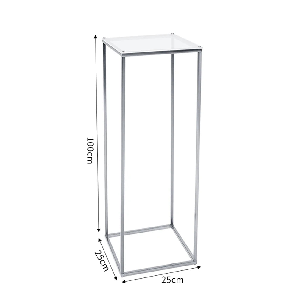 Tall metal stand with a square top, measuring 100cm in height and 25cm on each side. The structure is minimalist with a metallic frame, ideal for display purposes.