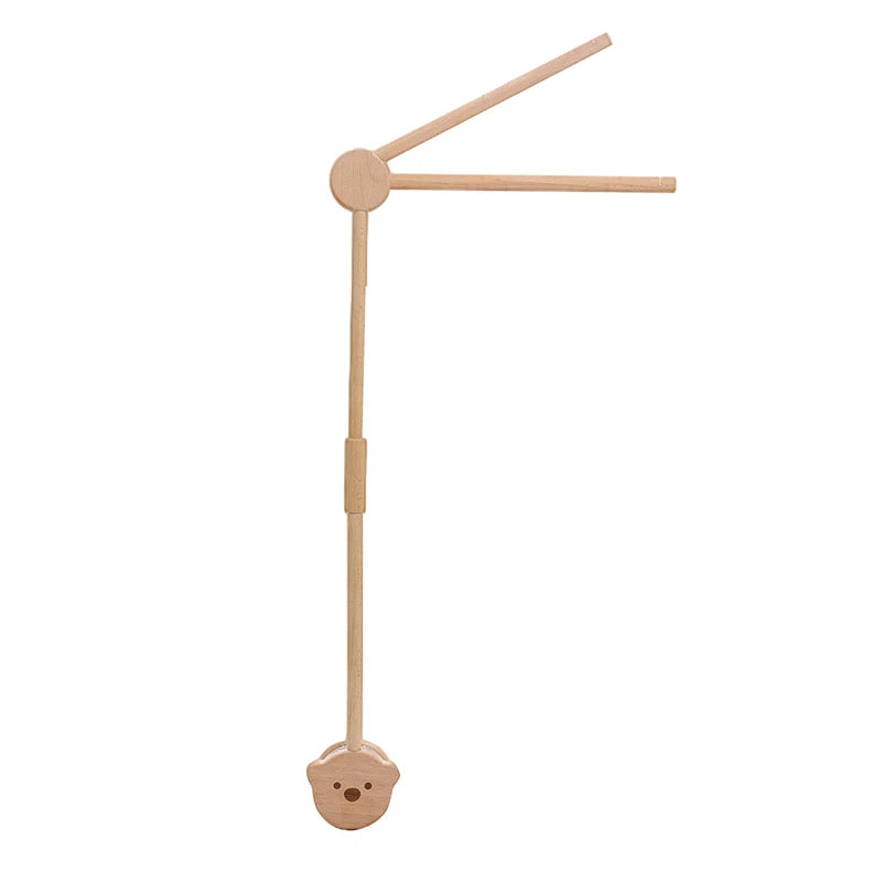Wooden manual massager with a long handle, circular rotating joint, and two massage arms. Features a bear-shaped face at the bottom.