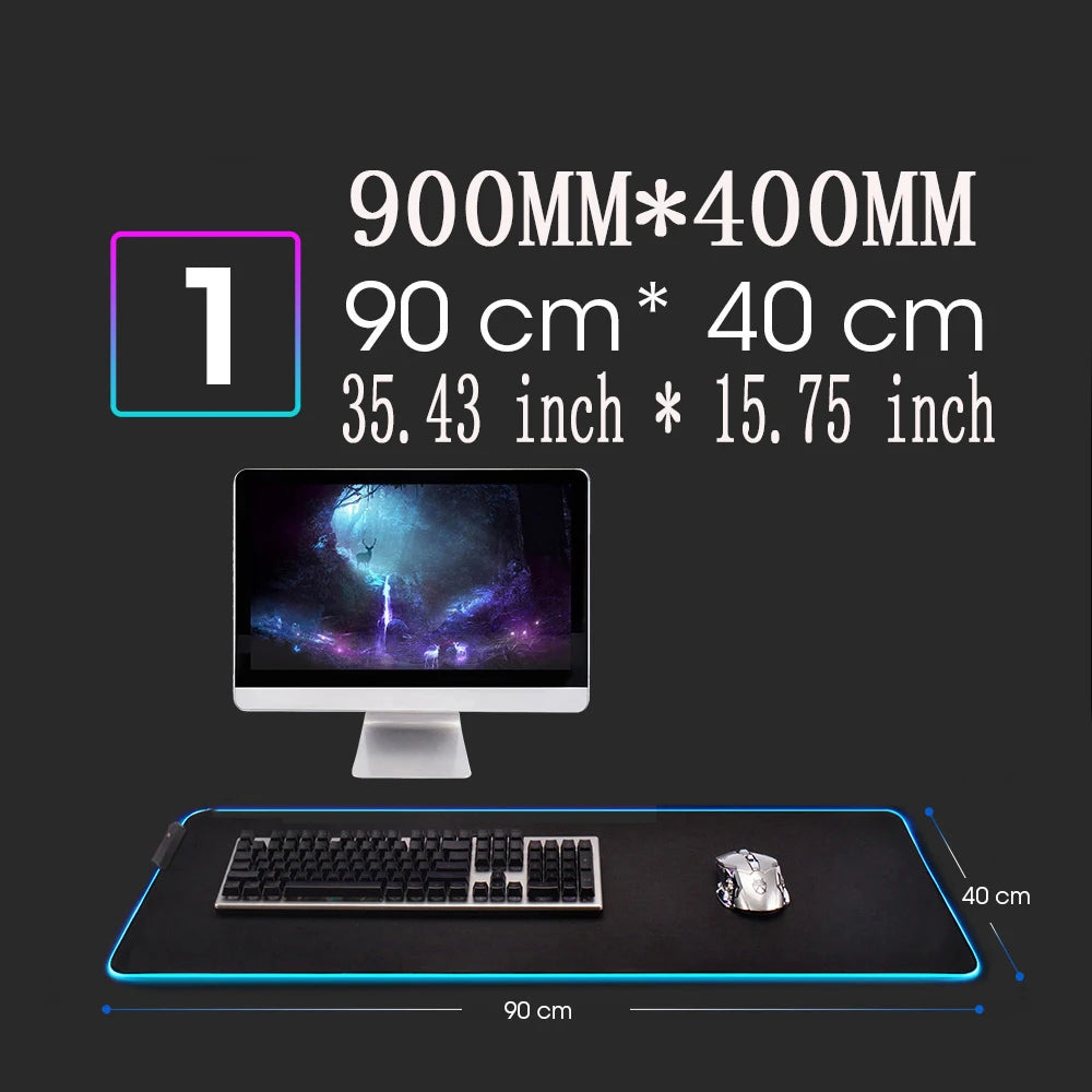 Image showing a computer with a large mouse pad measuring 900mm x 400mm (35.43 inches x 15.75 inches) in front of it, with a keyboard and mouse placed on it.
