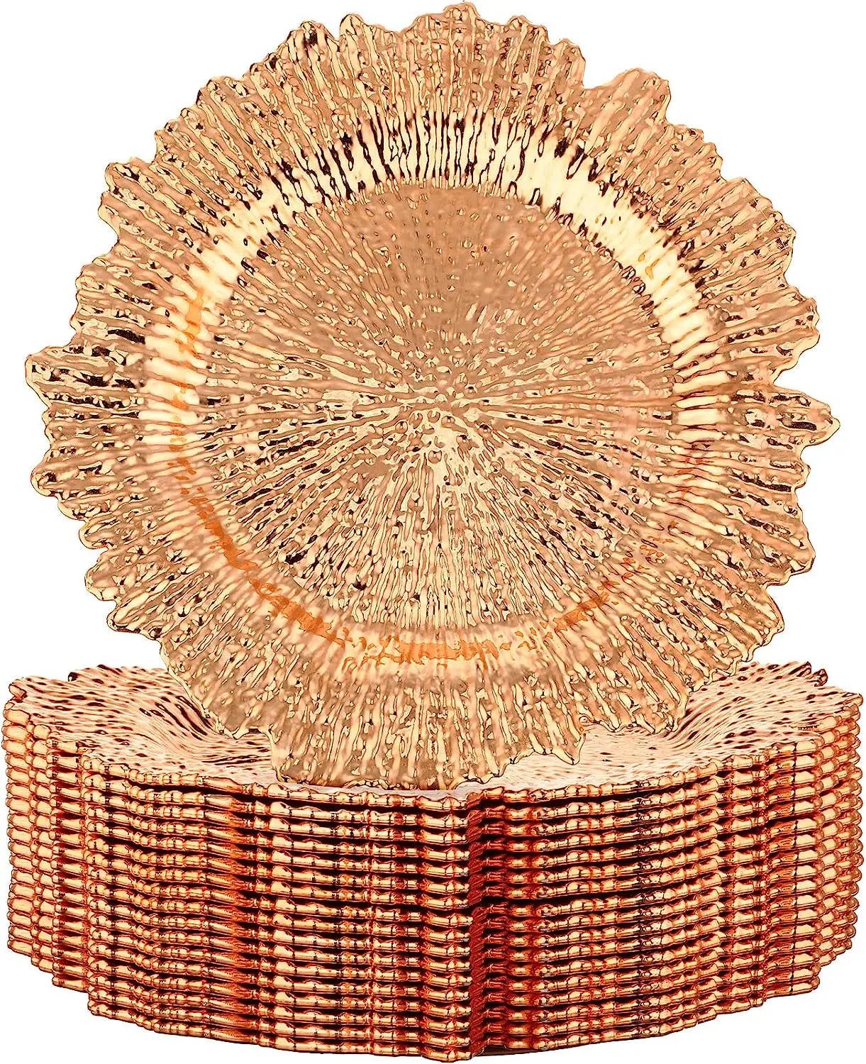 A stack of shiny, textured gold charger plates with a wavy, ridged edge and intricate pattern, creates an elegant and luxurious table setting appearance.