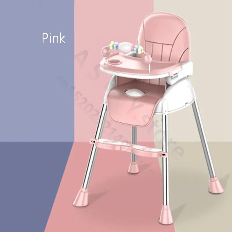 Pink high chair with a tray featuring toys, supported by metal legs. The chair stands on a background with blue, pink, and beige sections. "Pink" is written next to it.