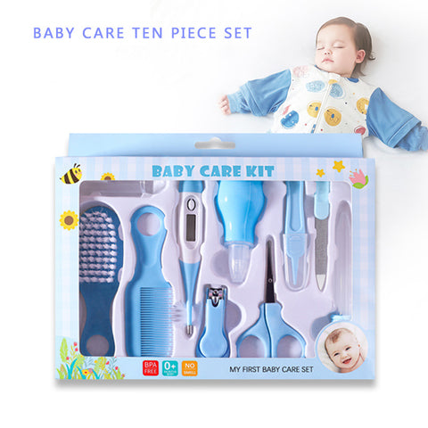 Baby care ten-piece set includes a brush, comb, thermometer, nose cleaner, scissors, nail clippers, files, and dropper in a blue package with a sleeping baby in the background.