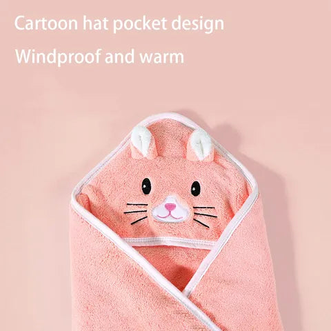 Pink cartoon animal-themed hooded towel with ears and face design. Text reads "Cartoon hat pocket design, Windproof and warm," highlighting its cozy and protective features.