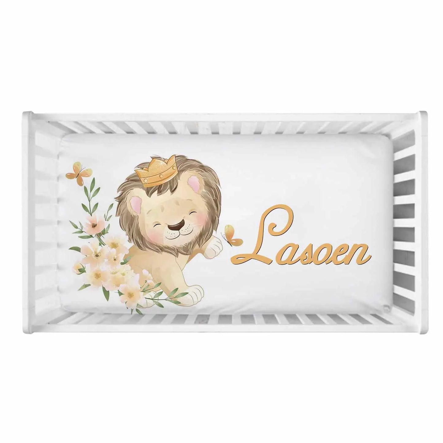 Crib bedding with a cute lion wearing a crown, surrounded by flowers and butterflies. The name "Lasoen" is written in elegant script next to the lion.
