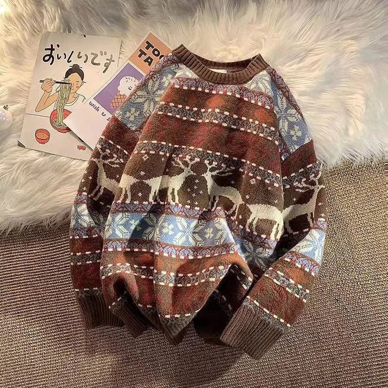 Cozy sweater featuring a winter pattern with reindeer and snowflakes in brown, blue, and cream hues. It lays on a soft fur background with illustrated books nearby.