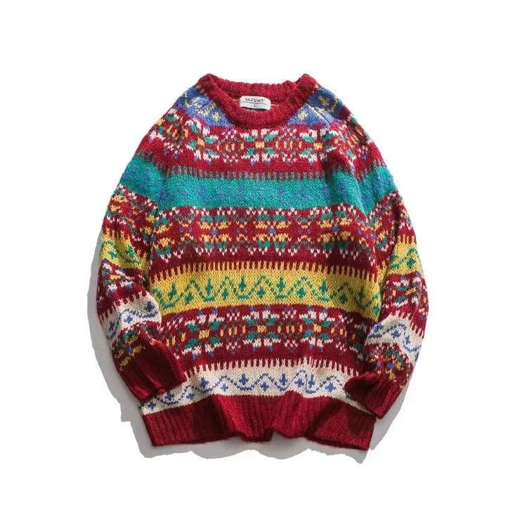Colorful knitted sweater with intricate patterns in red, green, blue, yellow, and white. It features horizontal stripes and geometric designs, creating a vibrant, festive look.