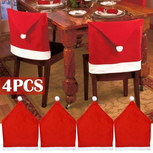 Four red and white Santa hat chair covers decorate a dining room set, with a festive table setting featuring plates, utensils, and napkins in a cozy, holiday-themed room.