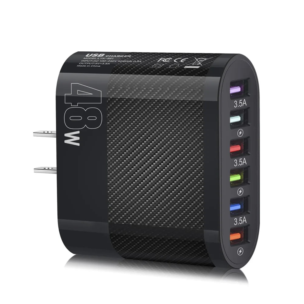 Black carbon fiber-textured USB wall charger with six colorful USB ports labeled 3.5A. Silver prongs are visible on the side, and "48W" is prominently displayed.