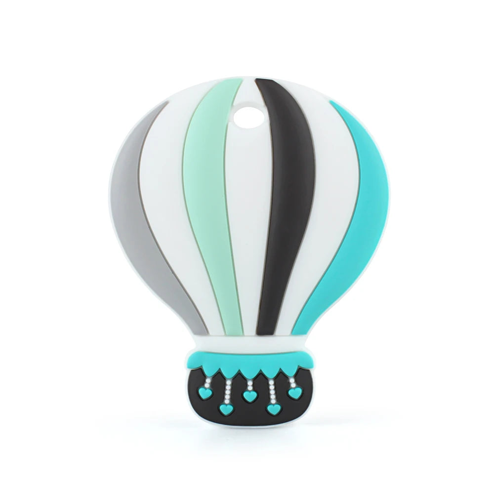 Colorful hot air balloon-shaped decoration with vertical stripes in grey, mint, white, and turquoise. Features heart-shaped details on the basket and a hanging hole on top.
