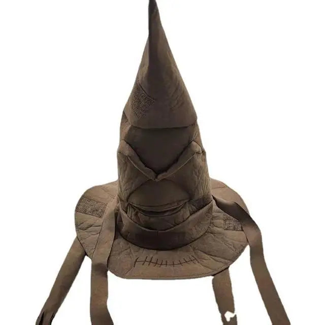 A brown, worn-out wizard hat with prominent stitching, sharp creases, and a pointed top. It has distinct facial features, resembling a character, with straps hanging down.