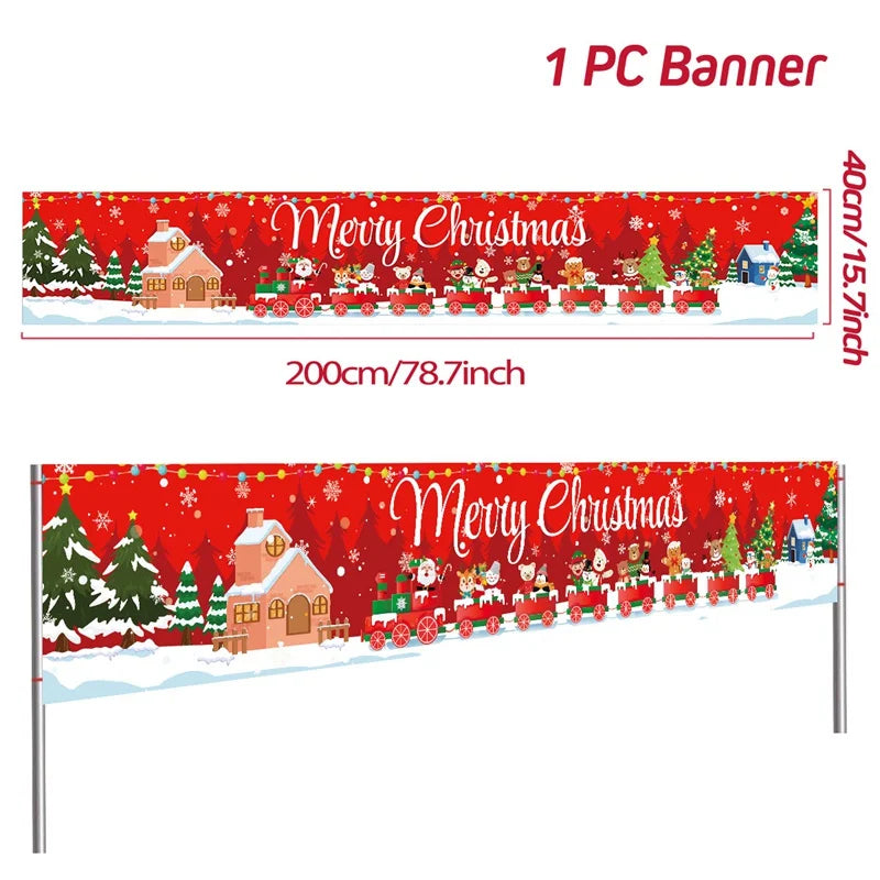 Red Christmas banner with "Merry Christmas" text, featuring Santa, reindeer, and gifts on a colorful train. Snowy village and trees in the background. Size: 200cm x 40cm.
