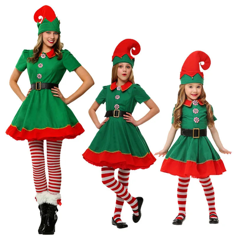 Three people in green and red elf costumes with striped leggings. Each is wearing a pointy hat and a dress with peppermint buttons and a black belt.