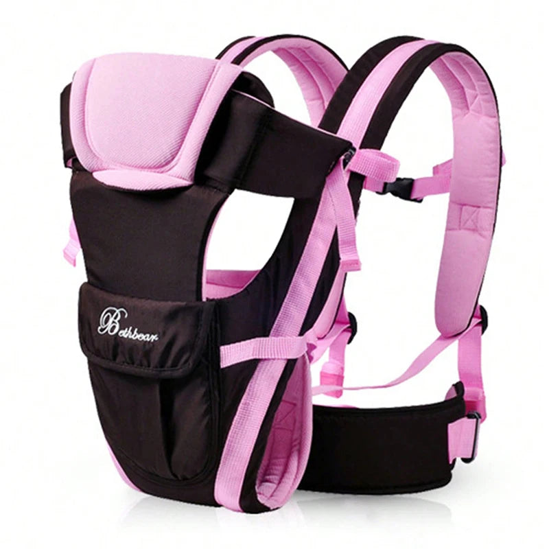 Pink and black baby carrier with padded straps and a front pocket. Features adjustable belts and ergonomic design for comfort and support.