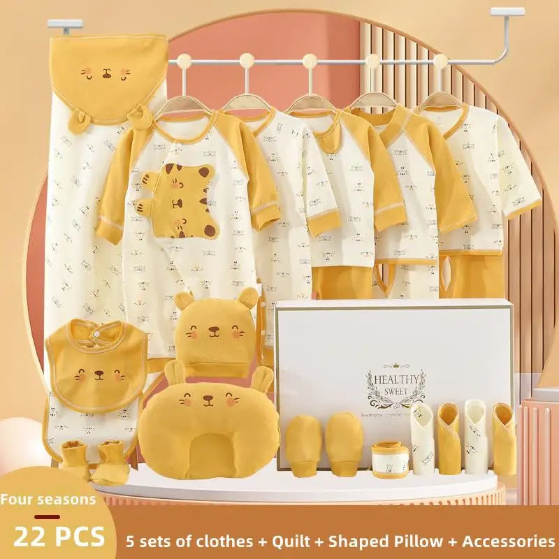 A 22-piece baby clothing set in white and mustard yellow featuring animal designs. Includes five sets of clothes, a quilt, shaped pillow, bib, booties, and more. Suitable for all seasons.